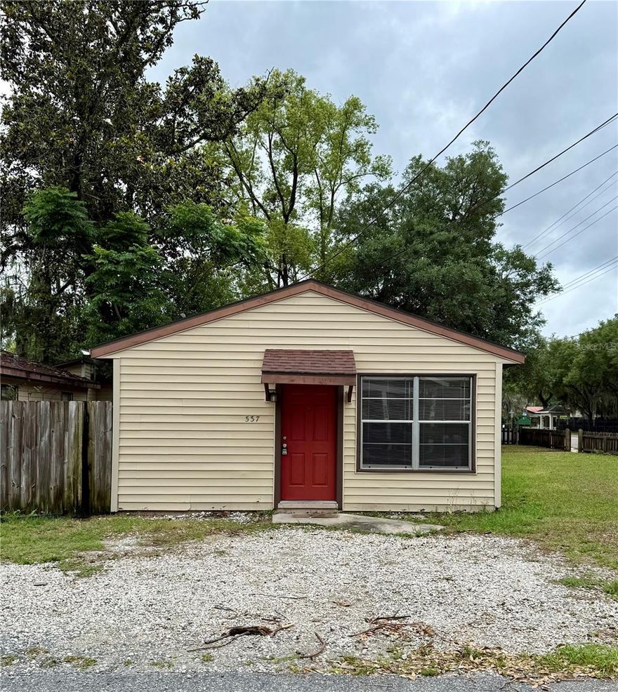 This 2-bedroom, 1-bath detached unit offers a private, single-family feel with tile flooring throughout and no carpet. The layout features a spacious living area, a separate dining area off the kitchen, functional kitchen with plenty of cabinet storage, and two comfortably sized bedrooms with natural light. Enjoy the private fenced side deck/patio with gate access. Open parking is located directly out front, and on-site laundry with washer/dryer is conveniently available on the property. Conveniently located near UF, downtown Gainesville, shopping, restaurants, and public transportation.