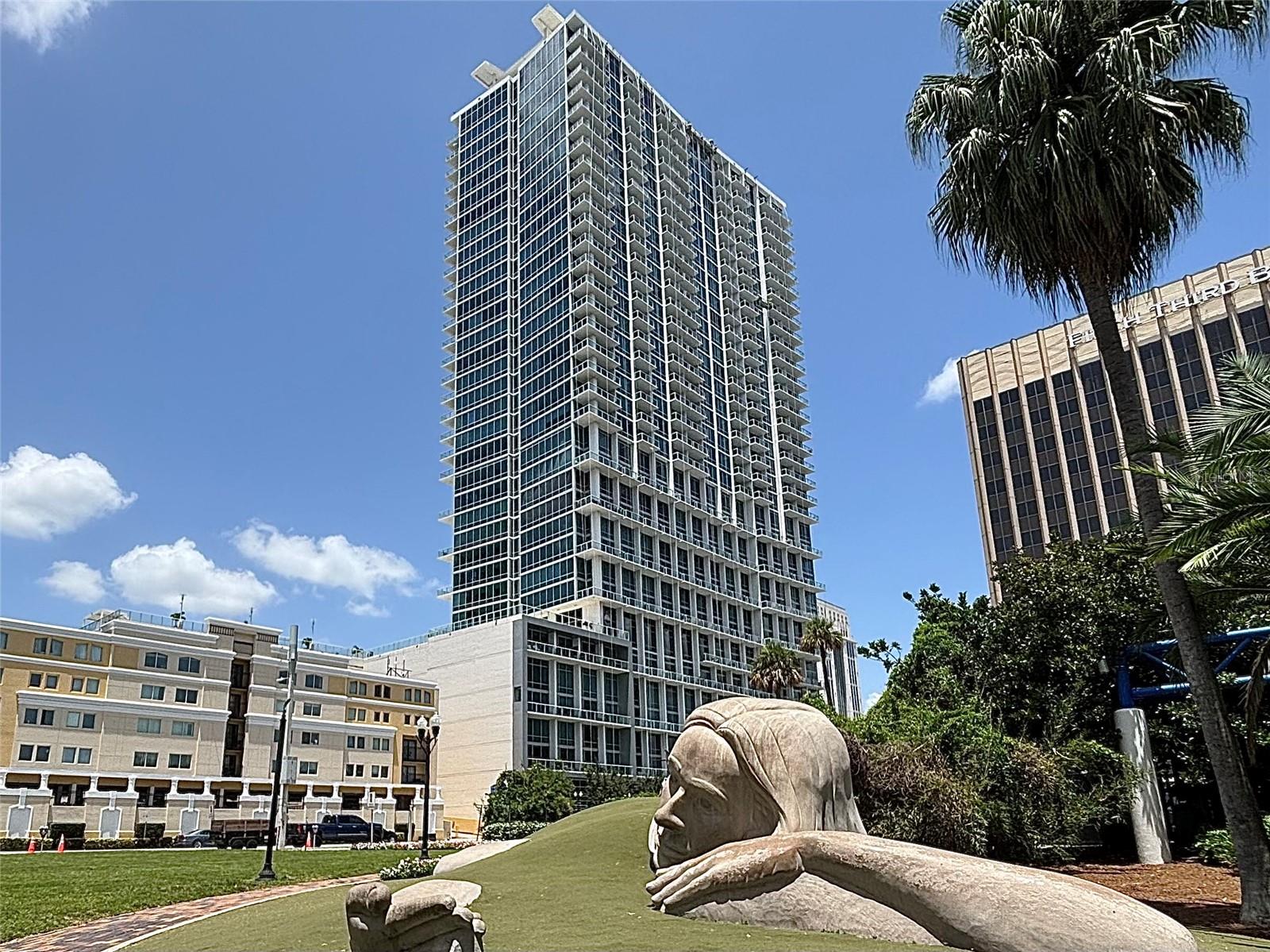 **Luxury 2-Story Loft in Downtown Orlando**
Experience upscale living in this stunning 2-story loft with 27-ft floor-to-ceiling windows and panoramic Lake Eola views from your private balcony. Features include a chef-inspired gas kitchen with stainless steel appliances and custom electric blinds. A dramatic spiral staircase leads to a loft bedroom with full bath and large walk-in closet; half bath located on the main floor. Washer/dryer unit included with rent! Building amenities feature an oversized pool, full fitness center, a basketball/tennis court, and community clubhouse with a theater.