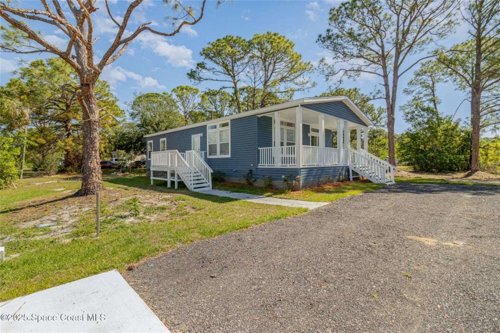 This well built new constructed manufactured home is located on a beautiful half acre lot located close to Grissom Pwky and Canaveral Groves. Easy access to major roadways. This home has spacious 3 bedrooms, 2 baths with front porch. Kitchen comes with all stainless appliances, lots of storage and breakfast bar. Open concept to living room and eat in area. Laundry room has storage cabinets and hookup. Home also has new septic system and culvert.