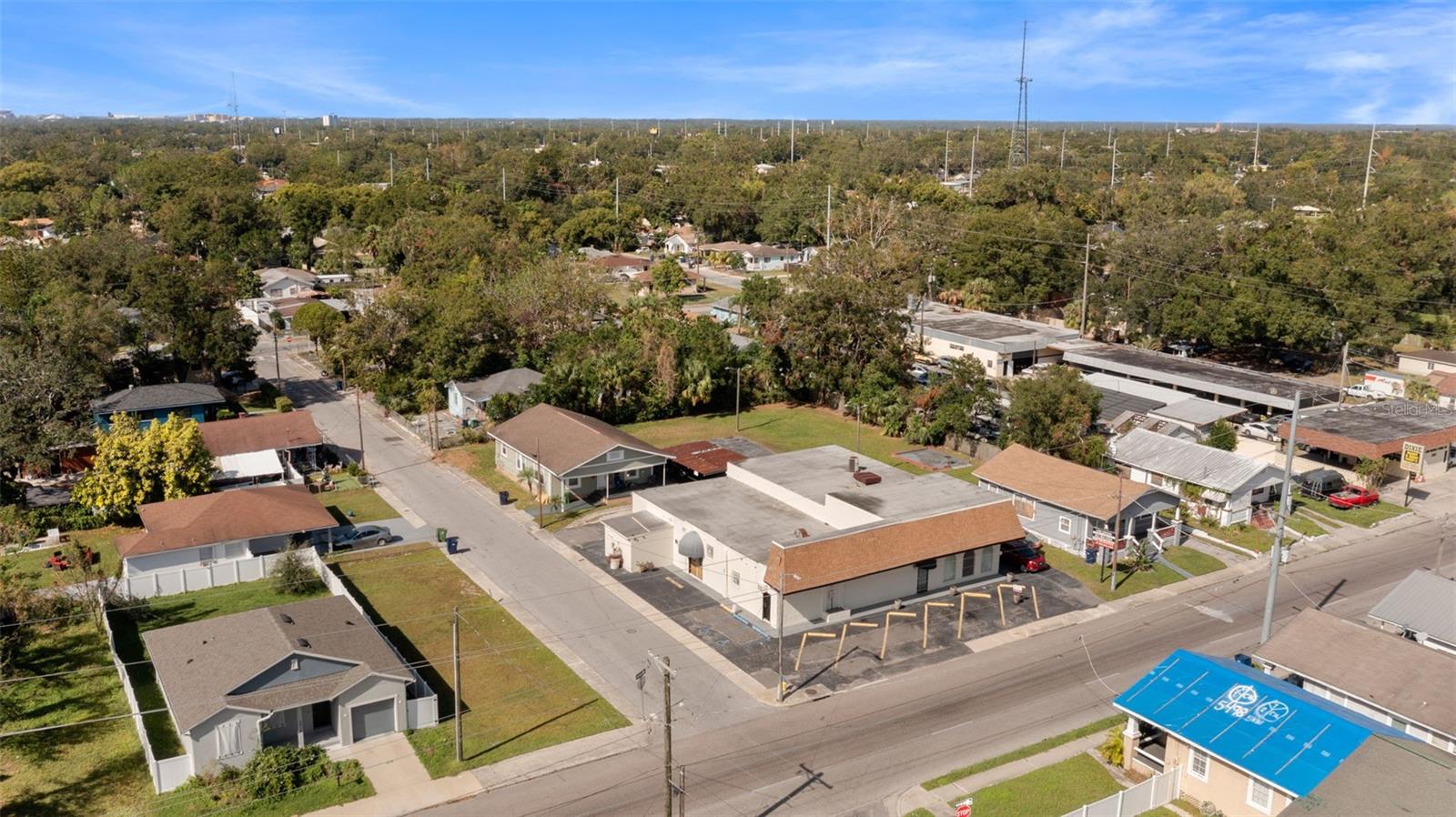 Exciting investment opportunity in Tampa! This property package includes a multi-use commercial building, two rental bungalows (located at 3420 N 15th St and 1410 27th Ave), and a vacant lot across the street at 3414 15th St, ideal for additional parking. The total gross area spans 4,952 sq. ft., offering endless potential to operate your business in the main building while generating income from the rentals.
The property features ample parking, including a rear lot with four covered spaces for employees or tenants. The additional lot (31x110) across the street provides space for extra parking or a small storage structure.
The main building includes:
A spacious auditorium with a stage (34x45),
Two large office areas (18x28),
Two smaller offices (9x20),
Two unfinished upstairs offices (18x12),
Several storage areas,
Five entry points for easy access.
The ground floor has the flexibility to be divided into smaller units for subleasing, providing even more income opportunities.
The two bungalows include:
Bungalow #1: 1,092 sq. ft., 3-bed, 2-bath
Bungalow #2: 1,353 sq. ft., 3-bed, 2-bath
Both bungalows are currently rented month-to-month at $1,500 each but have the potential for market-rate increases to $2,000–$2,500 a month.
Situated close to the vibrant Ybor City business district, downtown Tampa, HCC campus, I-275, and Tampa International Airport, this corner complex boasts a strong rental history and consistent income.
The combined parcels, totaling 33,430 sq. ft., have potential for rezoning to a Planned Development (PD) for a multi-family complex. Buyers will need to submit a pre-application to the City of Tampa to begin the rezoning process. All due diligence is the responsibility of the buyer, as the seller makes no guarantees regarding rezoning.
This property is ideal for investors looking to create immediate cash flow while navigating the rezoning process. Don’t miss out on this unique opportunity!
