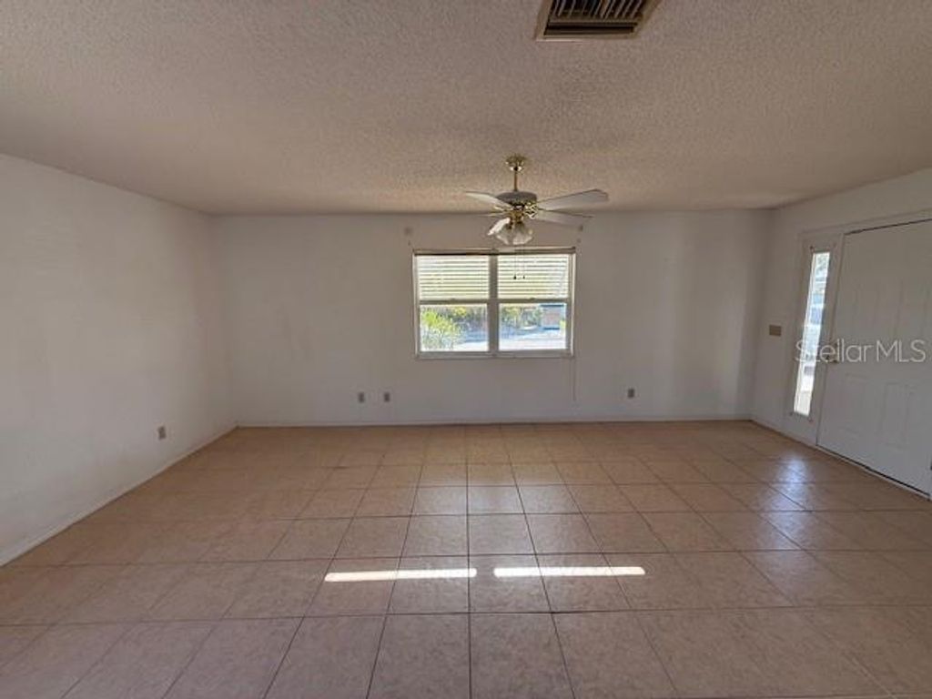 Photo of 7035 Tamarind Drive, Lake Wales, FL 33898 (MLS # S5139712)