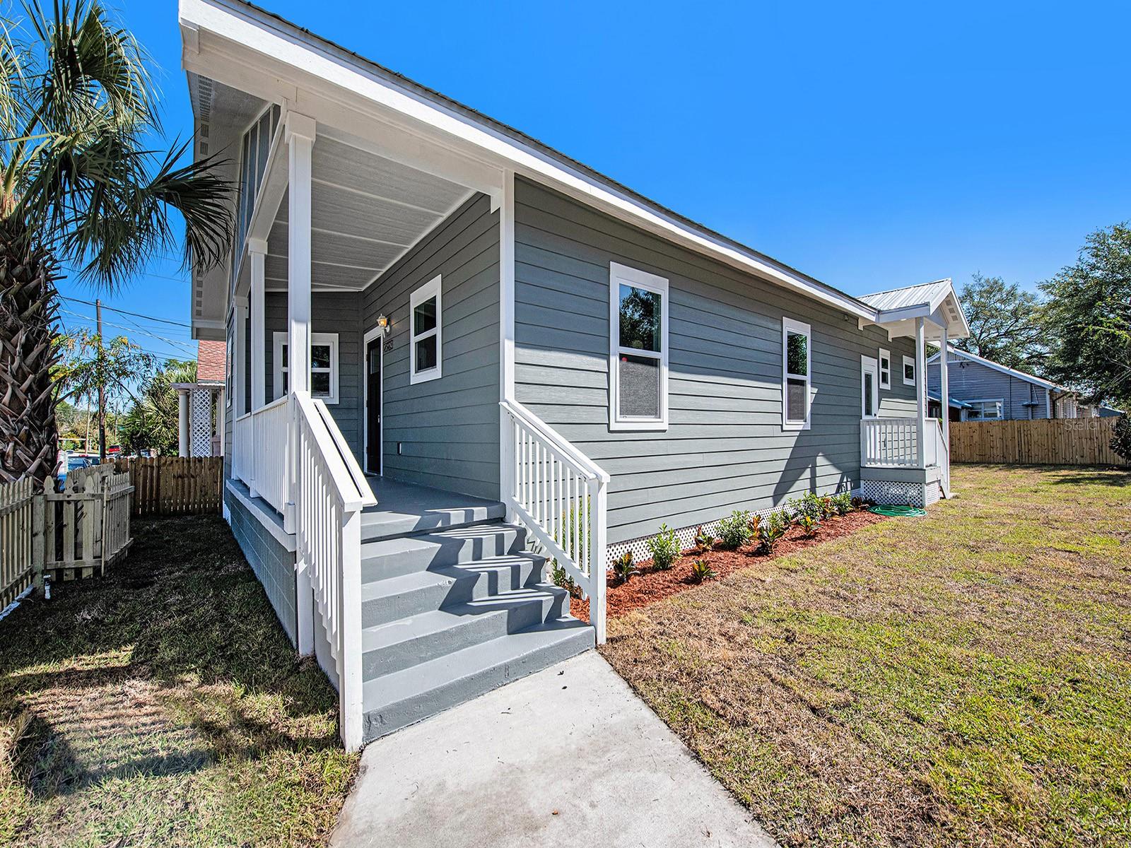 Welcome home to your 95% NEWLY built and re-built beautiful bungalow-style house located in the heart of Ybor City and downtown Tampa. Nestled on an oversized lot with off-street parking, you will fall in love with the charming front porch, perfect for enjoying the Florida weather with a morning cup of coffee or a glass of wine in the evening.
The home boasts updated/NEW framing and piers, 100% NEW electric and plumbing systems, NEW air conditioning including all-NEW duct work, a brand-NEW metal roof, all-NEW drywall and insulation as well as all-NEW siding. The recently completed NEW concrete driveway provides ample parking for you and your guests.
Walking through the front door, you will be greeted with a bright and open living space, complete with recessed lighting, designer flooring, and plenty of natural light. The upgraded kitchen features an island with tile accent, hood vent, new stainless steel appliances, and a spacious walk-in pantry.
The private family spaces are equally as impressive with bright and airy bedrooms offering ample closet space. The all-New 2022 rear addition added onto this house replaced an older addition that was removed. It was rebuilt larger from the ground up to allow for a better flow in the back of the house where the luxurious master suite features a walk-in closet and gorgeously appointed master bathroom with a large walk-in shower. This all-NEW 2022 addition also includes the laundry room and both brand new bathrooms.
You will be just minutes away from all that downtown Tampa has to offer, including incredible shopping, dining, and entertainment options. The home is also conveniently located near Ybor City, Channelside, and Heights district, and only a short 15-20 minute drive to the airport.
Don't miss out on the opportunity to make this gorgeous, fully updated home your own! Call today to schedule a private showing.