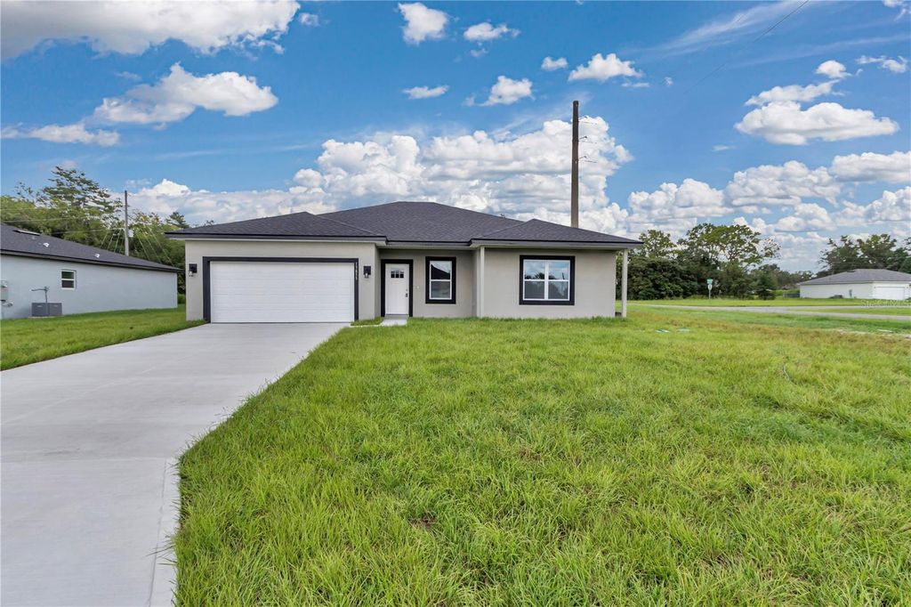 Photo of 13855 SW 47th Circle, Ocala, FL 34473 (MLS # O6366037)