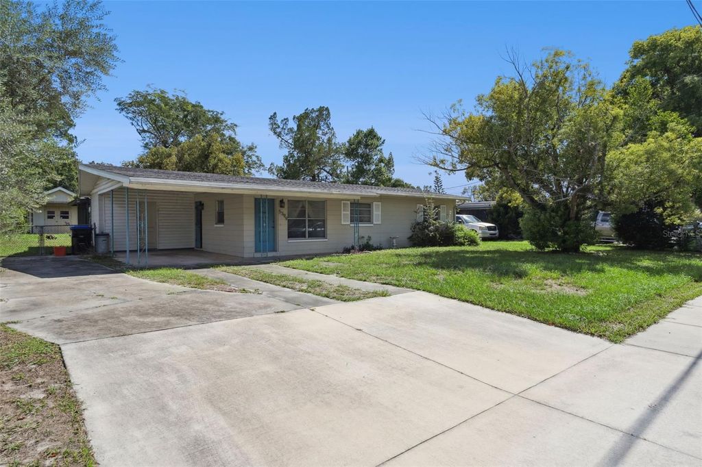 Photo of 5399 Paladin Way, Orlando, FL 32810 (MLS # O6350762)