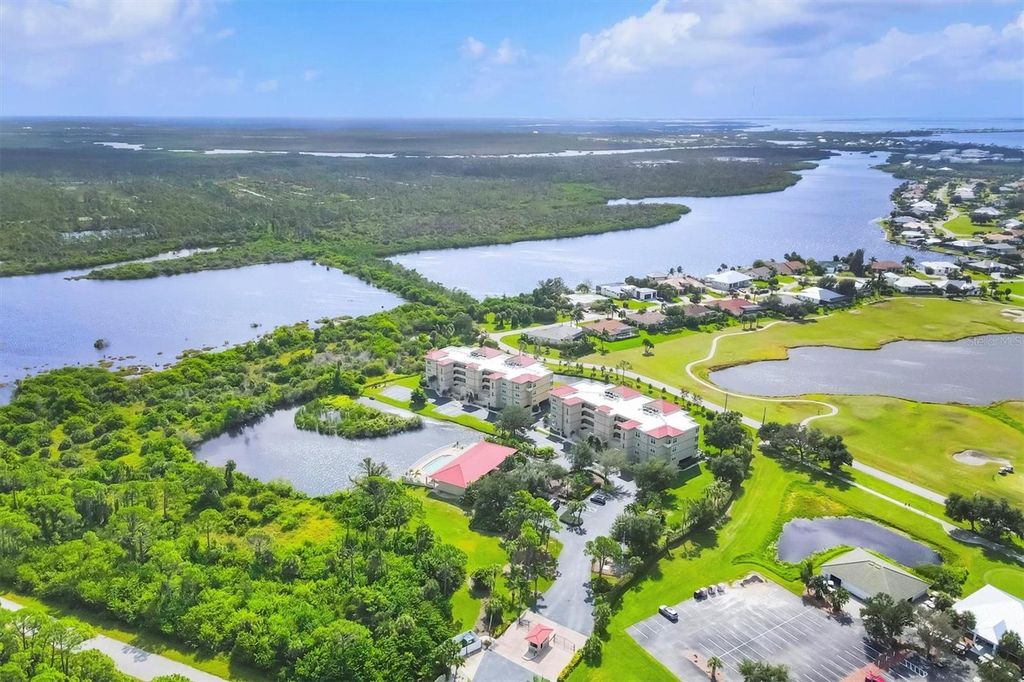Photo of 10045 Links Lane #304, Rotonda West, FL 33947 (MLS # D6143979)