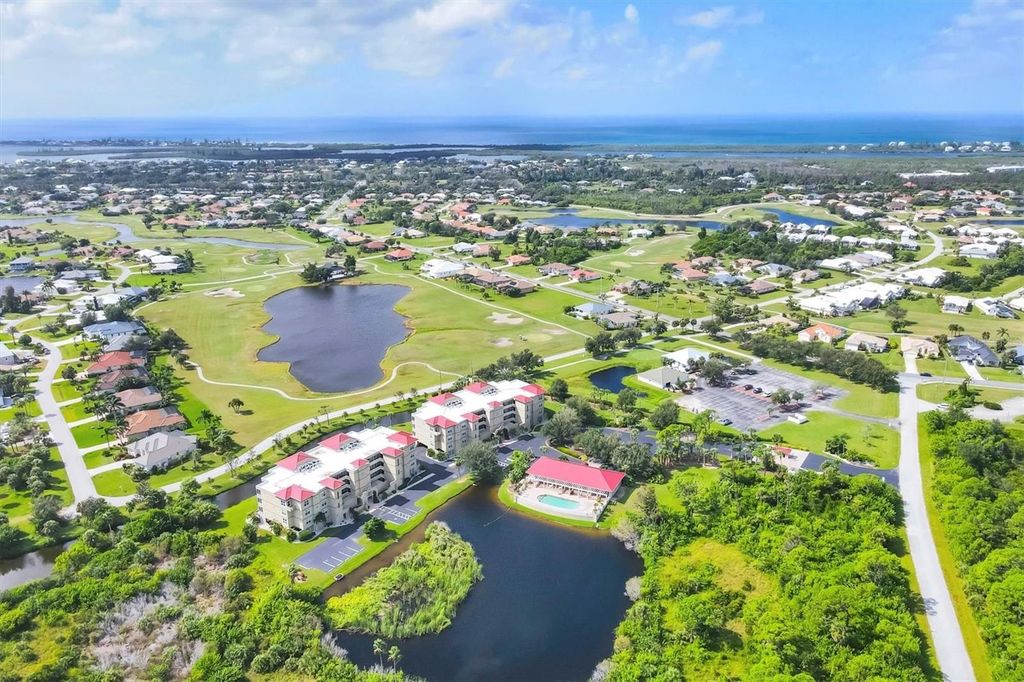 Photo of 10045 Links Lane #304, Rotonda West, FL 33947 (MLS # D6143979)