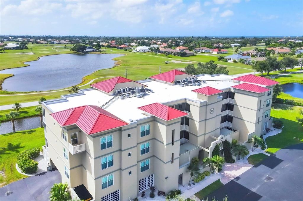 Photo of 10045 Links Lane #304, Rotonda West, FL 33947 (MLS # D6143979)