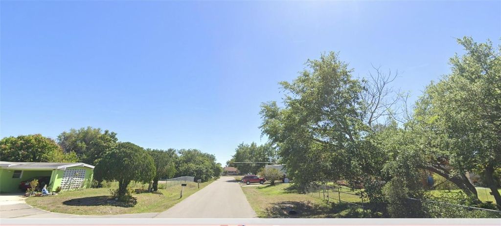 Photo of 629 Gaines Street, Port Charlotte, FL 33952 (MLS # O6365649)