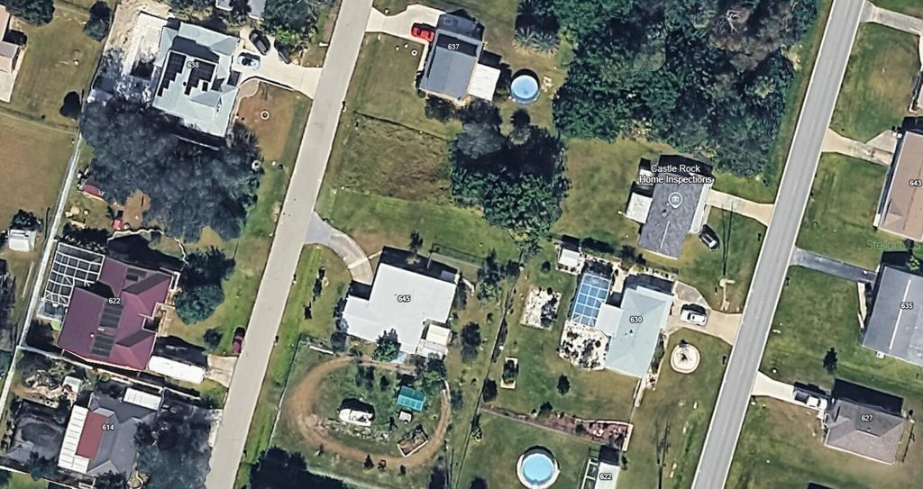 Photo of 629 Gaines Street NW, Port Charlotte, FL 33952 (MLS # O6365649)