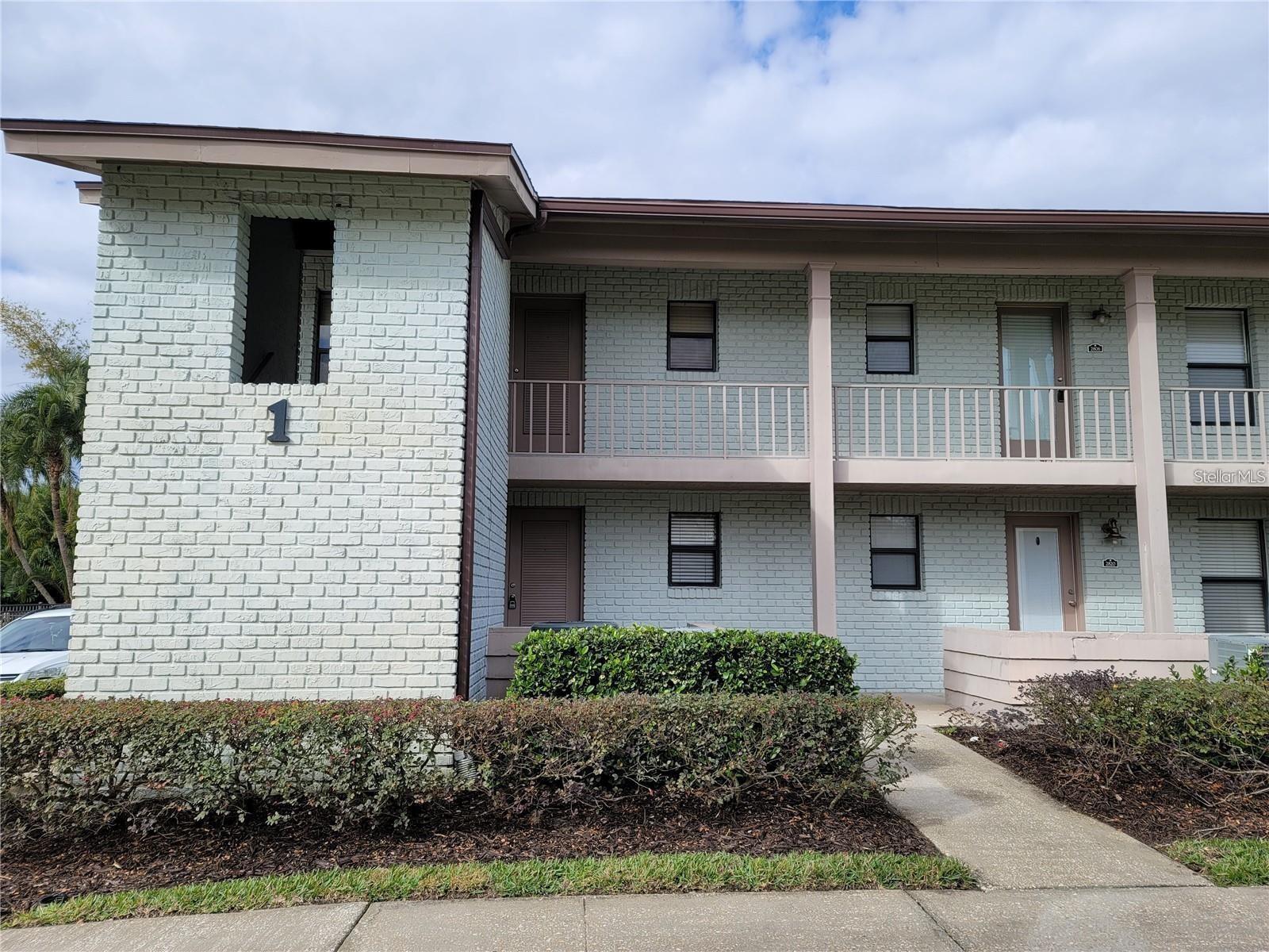 Introducing a pristine and well-kept 2-bedroom, 2-bathroom ground floor unit in downtown Orlando's highly sought-after Audubon Park neighborhood. This unit offers a stylish living space with laminate and carpeted floors. The open living room/dining room combo leads to a screened porch, providing a relaxing outdoor space. Natural light fills the unit, creating a bright and welcoming atmosphere. Conveniently located in Building One, this first-floor unit offers easy access to one of the two pools within the community. Additional amenities include a fitness center, clubhouse, and nearby bicycle rentals. A reserved parking spot is provided, and ample open parking is also available. The community of Audubon Park Condominiums is pet-friendly and offers a range of activities within walking or biking distance, including Lake Druid's Dog Park, East End Market, shopping, and entertainment. The in-unit laundry for added convenience. The screened porch provides a pleasant view, and a storage closet is available for extra space. Audubon Park is situated near Winter Park, Baldwin Park, and Fashion Square Mall, offering easy access to an array of shops, restaurants, and entertainment options. With its fantastic location and numerous amenities, such as two pools and a gym, this Audubon Place Condo provides a comfortable and vibrant living experience in the heart of Orlando. Don't miss the opportunity to call this home—apply today!