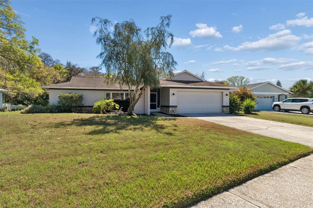 Photo of 9930 Nicklaus Drive, New Port Richey, FL 34655 (MLS # TB8479830)