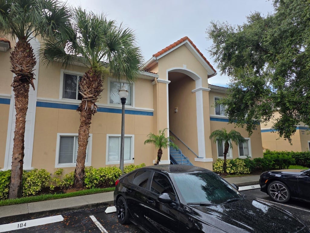 Photo of 516 Villa Del Sol Circle #103, Orlando, FL 32824 (MLS # S5158549)