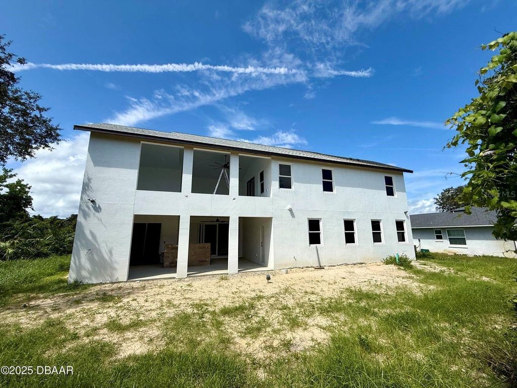 Photo of 9 Sweetbay Drive, Palm Coast, FL 32137 (MLS # O6341467)