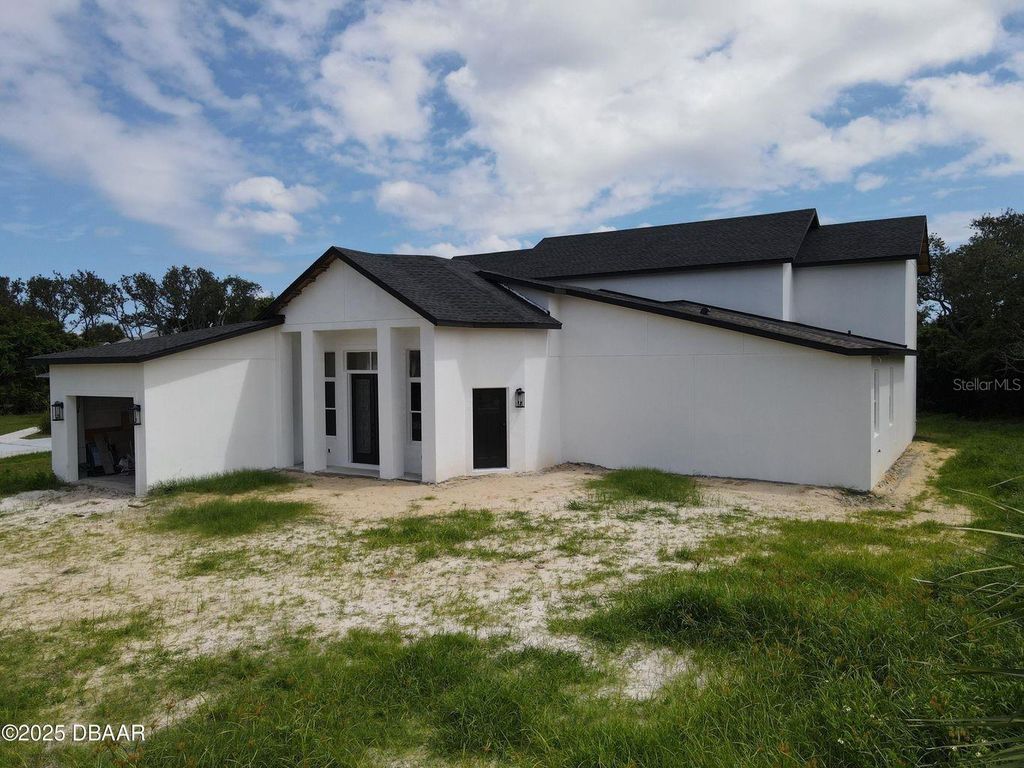 Photo of 9 Sweetbay Drive, Palm Coast, FL 32137 (MLS # O6341467)