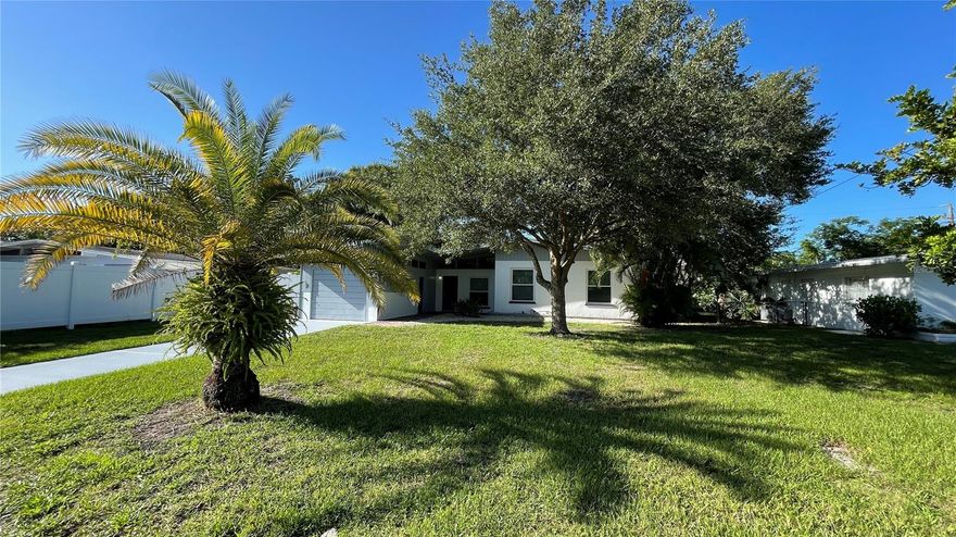 Turnkey Furnished Short-Term Rental Available 1/1/26 - 1/31/26 Only. Recently renovated Mid-Century Modern 3 bedrooms, 2 baths, 1 car garage home just minutes from Downtown Sarasota. Open concept living and dining rooms with cathedral ceilings and wood beams. The Interior and Exterior of the home have been freshly painted. The home has restored Terrazzo flooring throughout. The fully equipped kitchen has new appliances, a pantry, plenty of cabinets for storage, an eat-in countertop that looks out to the living room. The master bedroom has an updated en-suite bathroom with a walk-in shower, the other 2 bedrooms share an updated bathroom with a shower and bathtub. The backyard is fenced and features an amazing paver entertainment area. Walking distance to the YMCA and famous Yoder's Amish Village. Minutes away from world-famous Siesta Key Beach, Lido Beach, St Armand's Circle, museums, and so much more.