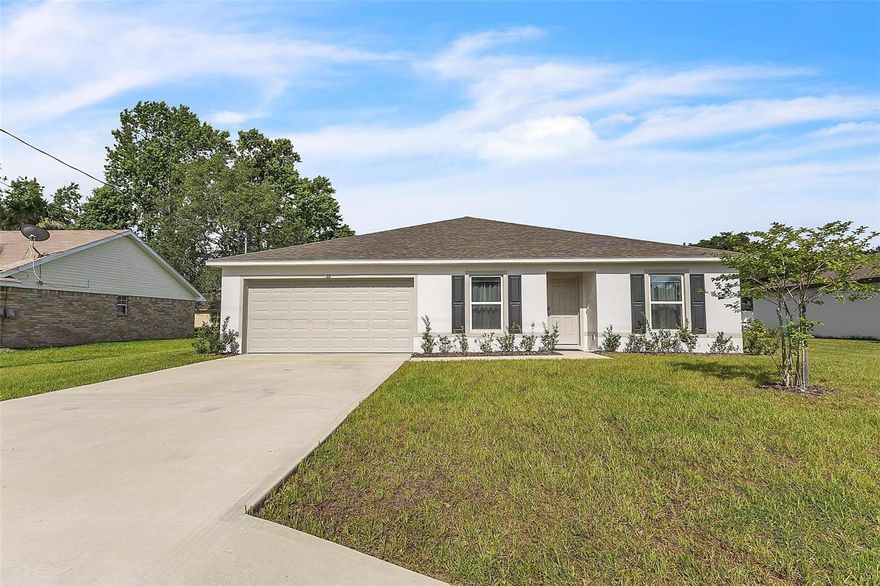 Built in 2024, this beautifully designed home offers modern style, quality craftsmanship, and a spacious open-concept layout perfect for everyday living and entertaining. Featuring stylish finishes, abundant natural light, and thoughtfully designed living spaces, this home combines comfort and functionality. No carpet in sight — offering easy maintenance and a clean, modern feel throughout the home. Enjoy the beautiful backyard, perfect for relaxing, entertaining, or adding your future pool to create your own outdoor oasis. Conveniently located in the desirable Lehigh Woods subdivision with no HOA and easy access to shopping, schools, parks, and the beach. A wonderful opportunity to own a newer construction home in beautiful Palm Coast! MUST SEE!