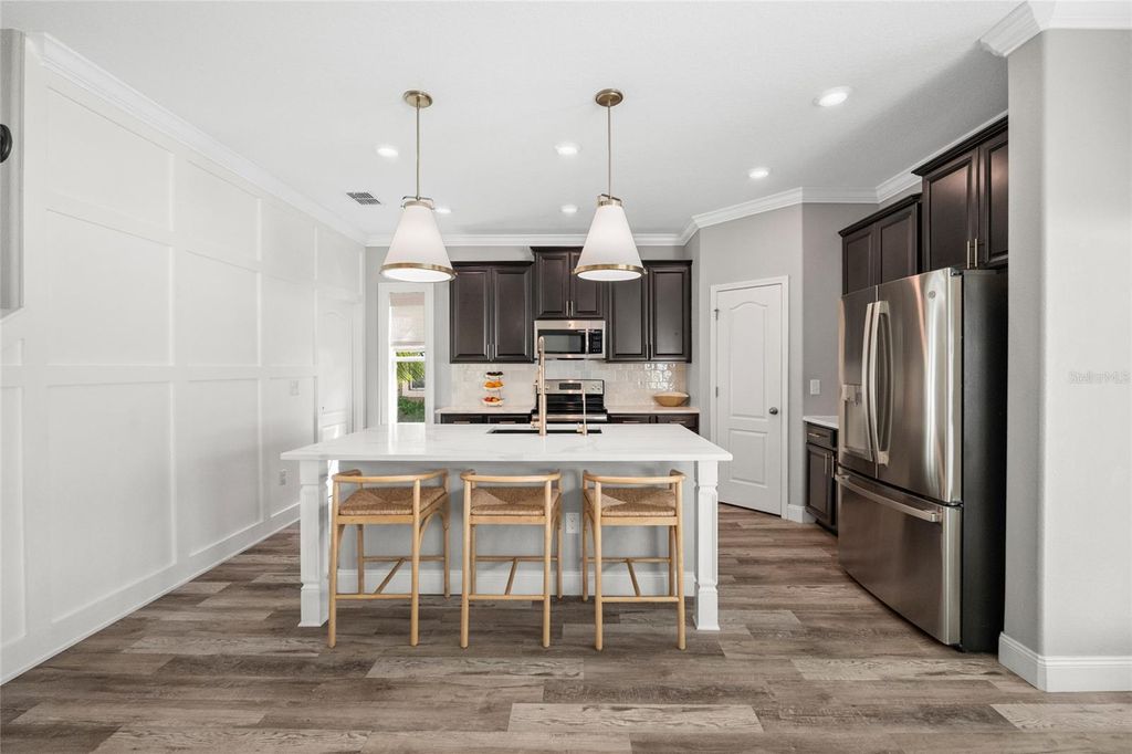 Photo of 11930 Lake Boulevard, New Port Richey, FL 34655 (MLS # TB8487916)