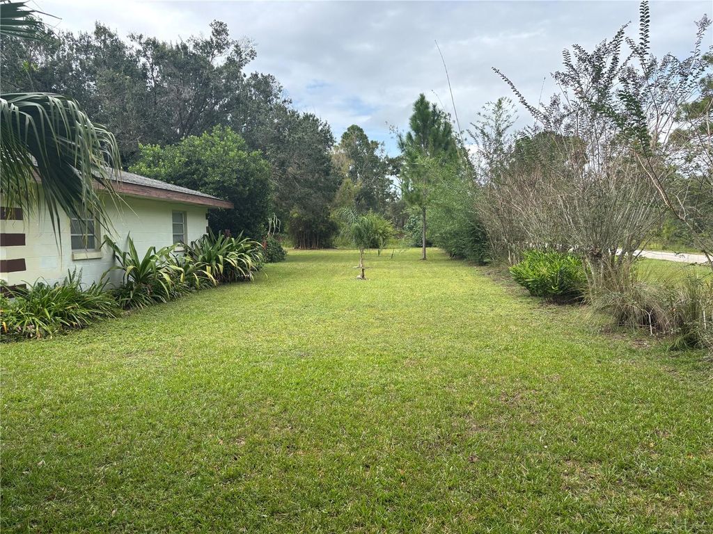 Photo of 3500 Orchid Drive, Indian Lake Estates, FL 33855 (MLS # TB8433824)