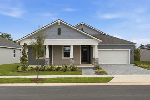 Photo of 320 Free Range Drive, Groveland, FL 34736 (MLS # O6351345)