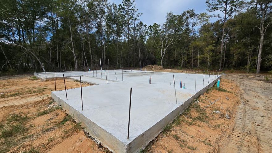 No permits needed! This homesite foundation and permitting is already completed, allowing for an accelerated construction timeline with an estimated completion in as little as five months. The lot is offered together with a construction contract, providing a seamless path to a brand-new home without the delays typically associated with new builds.

The lot price is $25,000, paired with a separate construction contract of $230,000, for a total package price of $255,000. The home to be built is the highly desired Agate Model, featuring 1,580 sq. ft., a spacious open-concept layout, 4 bedrooms, 2 full bathrooms, a spacious garage, and elevated finishes including 9’5’’ ceilings and tile flooring throughout.

Photos shown are of a similar completed home and are provided for reference.
For details on available options, color selections, finishes, and next steps, please inquire for additional information.