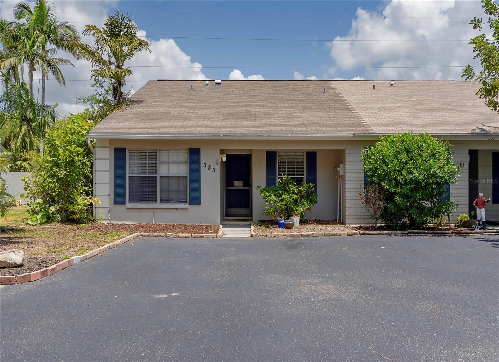 Discover the inviting charm of Safety Harbor in this updated end-unit villa, ideal for enjoying Florida living and sunshine. This home features a spacious split floor plan with two comfortable bedrooms and two well-appointed bathrooms. The modern kitchen boasts solid wood cabinets, sleek stainless steel appliances, unique stone countertops, and plenty of storage. In the combined living and dining area, airy vaulted ceilings create a bright and open feel. You'll find the secondary bedroom and guest bath towards the front, while the peaceful primary bedroom, complete with an en-suite bathroom and calming water views, is located at the back. A delightful screened back patio offers serene pond views. Rent includes trash, access to the community pool and landscaping services. This property is situated outside the flood zone and provides convenient parking for up to four vehicles. Enjoy pleasant strolls to the nearby Philippe Park, just a short six-minute walk away, or grab dinner or coffee in Downtown Safety Harbor. Come and experience the fabulous Safety Harbor lifestyle this lovely villa presents.