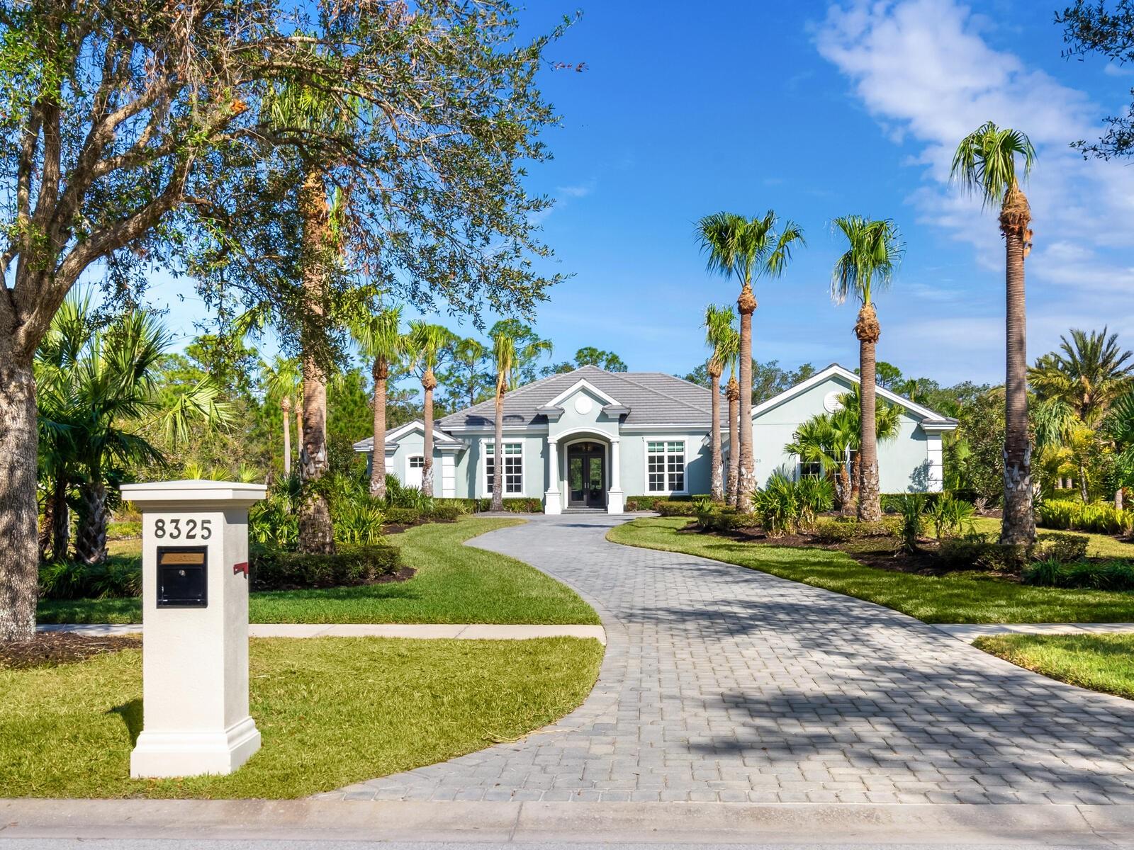 This exquisite home is a masterpiece of luxury and modern design, nestled in a gated, low-density community known for its large home sites and serene privacy. Built by the renowned Anchor Builders, it offers unparalleled craftsmanship, thoughtful upgrades, and a harmonious connection with nature, with preserve views in both the front and back. Set on a 1-acre lot, this former model home is designed for comfort and elegance. Inside, you’ll find soaring 12- and 13-foot ceilings, oversized impact-resistant windows and doors, and light oak flooring throughout. The open floor plan is anchored by a stacked stone fireplace and showcases a gourmet kitchen outfitted with Thermador Masterpiece appliances, a vented range hood, two islands, and quartz countertops, perfect for entertaining and culinary pursuits. The home features 4 bedrooms, 3 of which are en-suite with walk-in closets, while the 4th functions as a flexible bonus room. The luxurious primary suite is a retreat in itself, boasting a spa-like bath with a rain shower, a floating tub, and custom closet built-ins. An office/den adds further versatility, highlighted by built-in cabinetry and a sleek glass barn door. Outdoor living is seamlessly integrated through a massive screened lanai with an outdoor kitchen, ideal for dining and relaxation. Modern conveniences abound, including an outdoor misting system, privacy blinds, landscape lighting, and Pentair remote pool controls. The property is equipped with cutting-edge upgrades, including a smart home system with Lutron switches, Icynene insulation throughout the entire home for energy efficiency, and a full-home backup generator for peace of mind. All major systems have been recently updated, ensuring a turn-key living experience. Furnishings are available for purchase under a separate contract, and optional club memberships offer access to fine dining and social opportunities. This home is a rare blend of luxury, technology, and natural beauty, designed for those who appreciate quality and elegance.