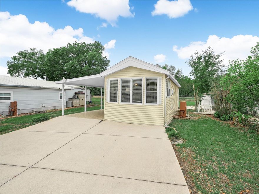 This one bedroom, one bathroom home comes fully furnished and turnkey.  Located in the premier 55+ community of Saddlebag Lake Resort, you own the land here, there's no lot rent.  Inside you will find a comfortable main living area, and the living room includes a new sleeper sofa, so the home will easily sleep four.  The kitchen has plenty of cabinets and counter space, and the dining area includes additional cabinets and a buffet counter.  The bathroom has a tub and shower combo, with a pocket door for entrance from the owners suite, but your guests can enter from the door in the hallway.  As nice as the inside is, you may find yourself spending your days, and evenings, in the expansive screened porch, with it's abundance of seating to accommodate the whole family or a large gathering of friends.  The home is situated where there is no rear neighbors, adding to the privacy of the outdoor living space.  The washer and dryer are inside the shed, with more than enough room leftover to store all your tools.  Keep your car cool and dry under the carport.  When it's time to venture out, the resort has so much to do you'll feel like you're on vacation every day.  Choose from a variety of activities, including swimming in the heated pool, playing tennis, shuffleboard, horse shoes or pickle ball, or hanging out in the rec room and playing pool.  There's also a screen enclosed hot tub, as well as men's and women's saunas.  Practice your swing at the driving range, or go boating and fishing in Saddlebag Lake.  Even your furry family members will be right at home here, as the resort is pet friendly and has a dog park at the back of the community. Come for the winter or live here year round, but call now to schedule a private tour before this great home is gone!