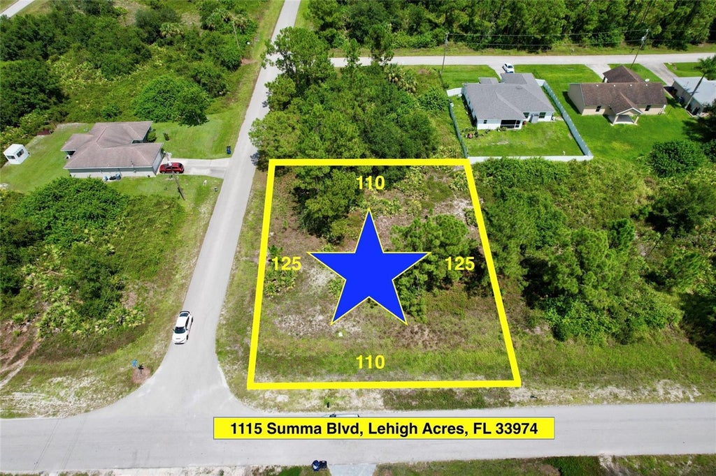 Photo of 1115 Summa Boulevard, Lehigh Acres, FL 33974 (MLS # O6449796)