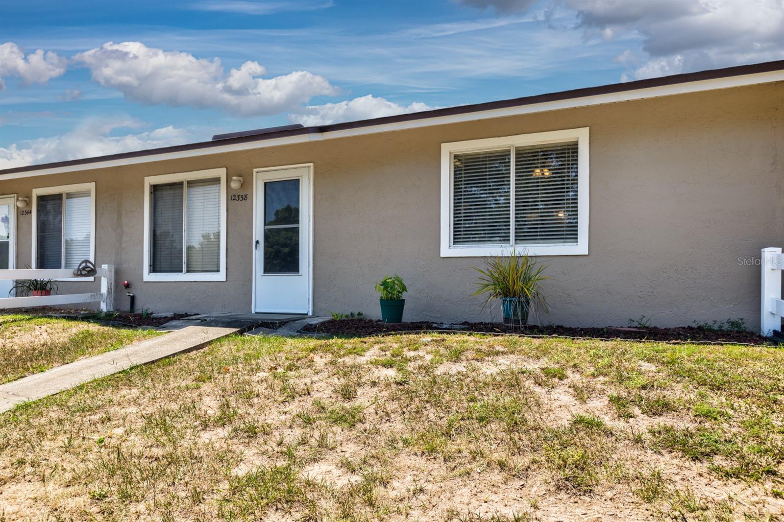 Tavares Condo with many updates in a Great Area! Close to shopping, restaurants, medical centers, parks, lake Dora, schools and entertainment in the up and coming Sea Pane City. This area is close to the action but off the heavily traveled path. The owners have spent the major money for improvements such as air conditioning, hot water heater, new electrical box, re-plumbed so you can relax and enjoy the possible benefits from lower insurance premiums. Kitchen is beautifully updated with gorgeous cabinetry, new appliances, counters, luxury vinyl flooring & lovely back splash, plus both bathrooms have undergone major remolding. All that is left for you is the fun part putting in your special touches to make this your home. Owner has moved North to take care of family and is hoping to find someone to enjoy this spot with wonderful neighbors as much as she did. Community pool is close by and a welcome retreat in our current heat. Rush to check out the possibilities and make this your next home.