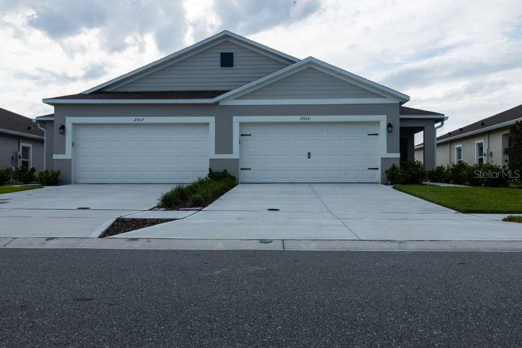 Fall in love with this stunning and modern 3-bedroom, 2-bath villa perfectly located in the desirable community of St. Cloud! Designed with an open-concept layout and filled with natural light, this home offers the ideal blend of comfort and style. The gourmet kitchen features granite countertops, stainless steel appliances, and a large island that overlooks the dining and living areas — perfect for entertaining or family gatherings. The spacious master suite includes a walk-in closet and a private bathroom with dual sinks and elegant granite finishes. Tile flooring throughout the main areas and a versatile flex room ideal for a home office or guest space.
Enjoy community amenities including a playground and a scenic walking path with fantastic views. Conveniently located near Narcoossee Rd., Lake Nona, Medical City, top-rated schools, shopping, dining, and major highways.