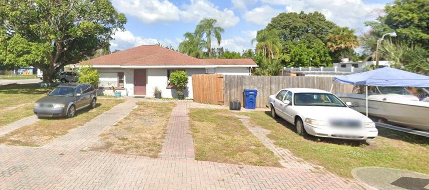 Terrific cash flow on this 3-unit home. Don't pay attention to the Manatee County website regarding size of the building  - it's clearly wrong. Largest unit, 3 bedroom, 2 bath  is rented at $2,300 and they pay their own utilities and hire out the lawn maintenance.. The 1/1 is occupied and he pays $1,000, but no utilities. The 4 bedroom, 2 bath is rented at $1,000 a room and they pay no utilities. 2 of the 4 rooms are currently rented. Two separated large backyards with concrete patios for the 2 large units. Mango fruit trees on property, Property had NO damage from either hurricane last year. No seller financing available; cash, conventional or DSCR mortgage pre-approval only.