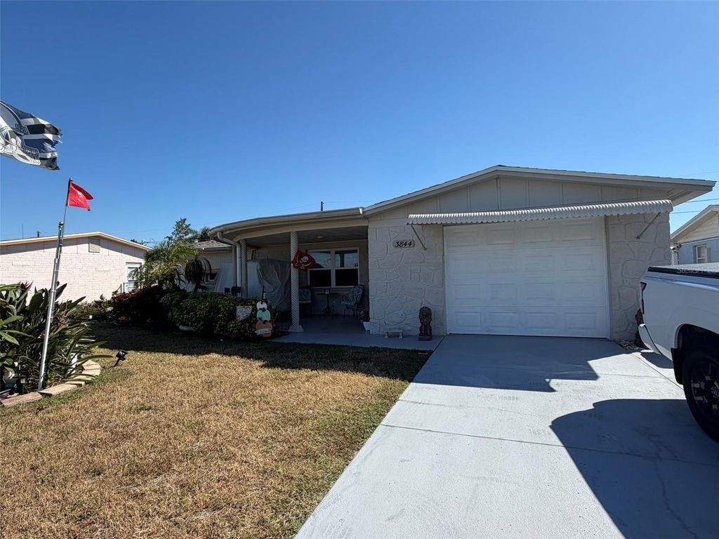 Photo of 3844 Redwood Drive, Holiday, FL 34691 (MLS # TB8467898)