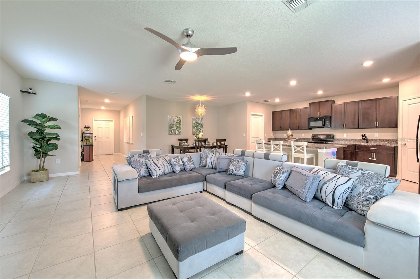 The Boston offers five bedrooms and two and a half bathrooms, with an impressive 2,215 square feet of living space. Perfect for large or multigenerational families, the oversized kitchen is ideal for entertaining guests or preparing hearty meals for everyone to enjoy, especially on cozy Sunday evenings. Connected to the dining area is a generously sized family room that serves as the perfect gathering spot between meals and activities. Upstairs, the private owner’s suite includes dual vanities and a separate water closet for added comfort. The second level also features four additional bedrooms, a full bathroom, and a versatile loft area—great for setting up a home office, play area, or movie lounge. The kitchen is beautifully outfitted with 36" staggered Chatham Umber raised-panel cabinets, sleek onyx GE® appliances, and durable granite-style Ink Vesta laminate countertops. The look is completed with 18x18 Tesola Taupe ceramic tile flooring, offering both style and easy maintenance. Located in the heart of Riverview, Timbercreek Manors is a vibrant single-family home community with top-notch amenities including a swimming pool, playground, basketball court, dog park, and clubhouse—providing fun and relaxation for everyone in the family. The homes comes with a brand new water heater installed as of July 10th!