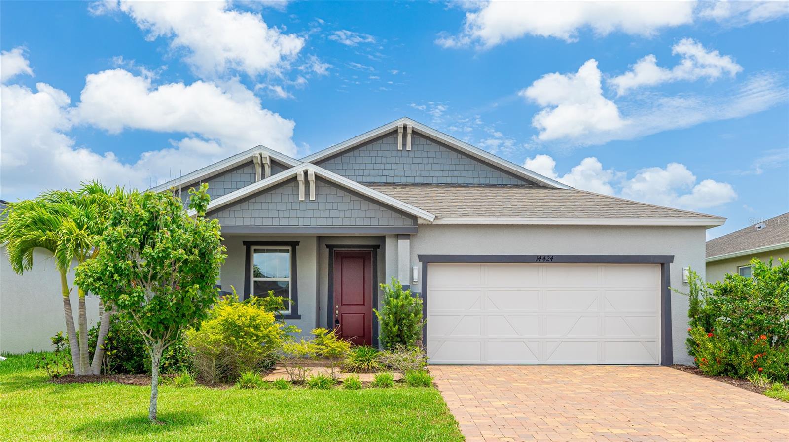 Welcome home! ***Gorgeous like new home within walking distance of grocery stores, restaurants, pharmacy, coffee shops, and anything you need!*** This spacious 4-bedroom, 2-bathroom gem has a relaxed, welcoming vibe from the moment you pull up. The paver driveway, lush landscaping, and detailed stonework out front set the tone, and it only gets better from there. Step inside to a light-filled, open layout that feels easy and comfortable—perfect for both quiet mornings and lively get-togethers. Out back, a peaceful pond view adds a calming touch to your daily routine. The kitchen is ready for whatever you’re cooking up, with granite counters, tons of cabinet space, and an Energy Star dishwasher to make cleanup a breeze. The primary suite is your own private retreat, complete with a soaking tub, double sinks, walk-in shower, and a huge closet. Guests will love the front bedroom that gives everyone their own space. Plus, you're just minutes from the restaurants and trails! Lakewood Ranch is the premiere subdivision in the area! Tour today.