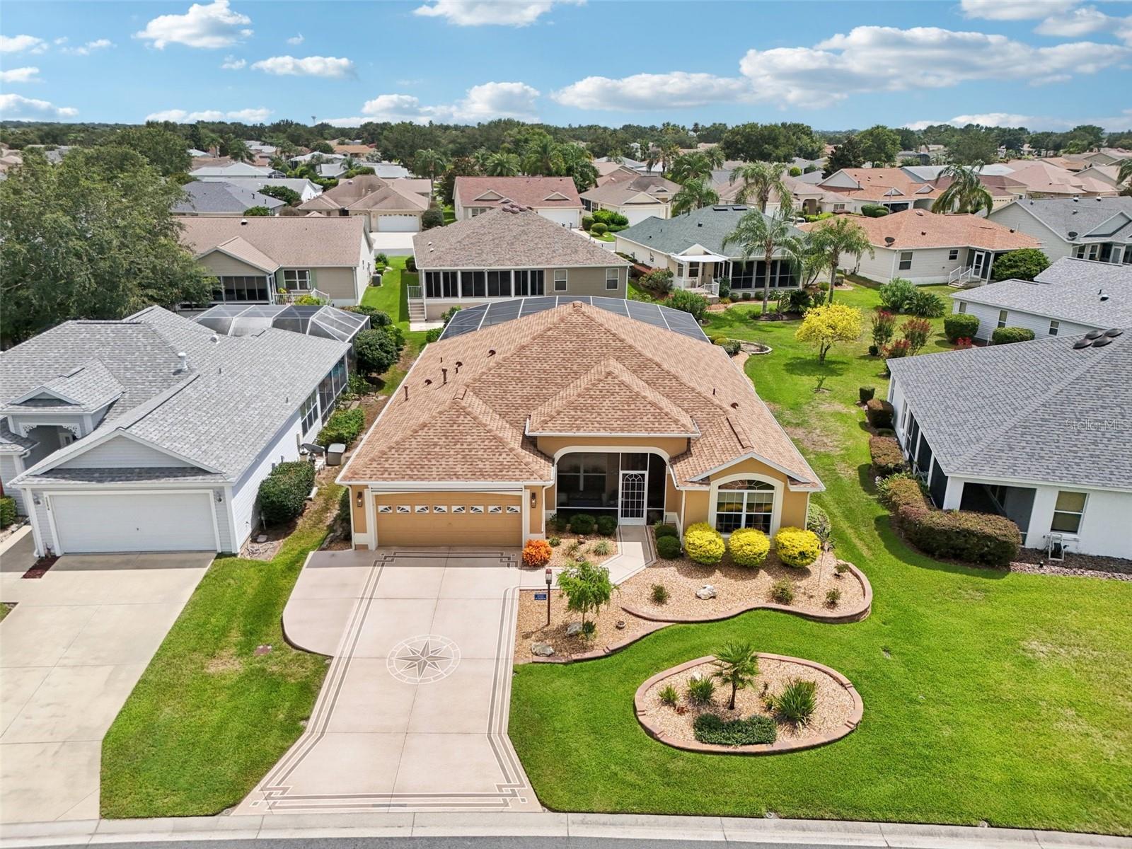 Discover this beautiful Salt Water Pool/Spa home perfectly located in the highly sought-after Village of Sunset Pointe. Notable updates include a Roof (2021), HVAC (2022), and Gas Water Heater (2019). This home has been meticulously maintained and features luxury vinyl plank and tile flooring, upgraded light and fan fixtures, soaring ceilings, and an open floor plan that creates a spacious, airy feel. The kitchen showcases gorgeous granite countertops, stainless steel appliances (2021), under-cabinet lighting, and natural gas cooking. The master bath was renovated in 2020, and the front porch is screened for added enjoyment. A large glass-enclosed lanai and expansive pool deck area make this home ideal for entertaining or relaxing, with all pool equipment updated in 2020. A whole-home water filtration system adds even more value. Outside, the pool and spa continue to impress. The pool is plumbed for a waterfall separate from the spa waterfall into the pool, and the beautifully stacked-stone landscaping provides outstanding curb appeal. Perfectly situated “between the 6s,” this home is less than 10 minutes by golf cart to Lake Sumter Landing and just a short ride to Cane Garden Championship Golf Course, Lake Miona Recreation Center, and numerous executive courses. Enjoy all the amenities The Villages provides in this stunning home designed for entertaining and the best of Florida living. Call today to schedule your private showing or arrange a FaceTime tour if you’re not local.