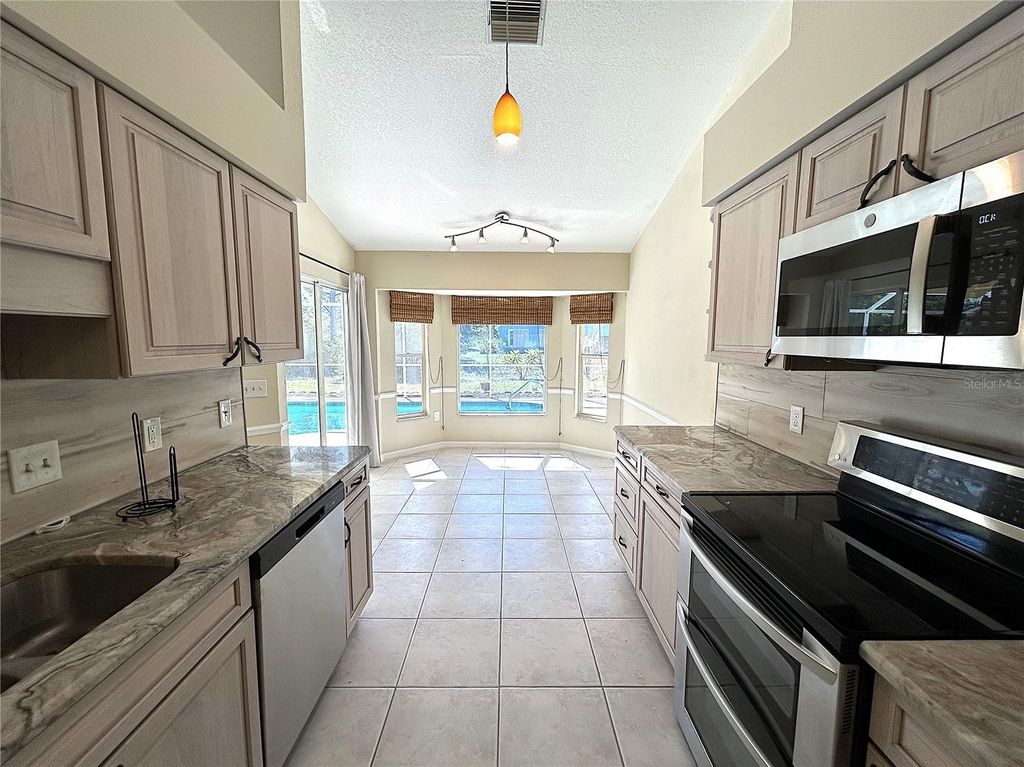 Photo of 9421 Fruitland Avenue, Englewood, FL 34224 (MLS # A4661976)