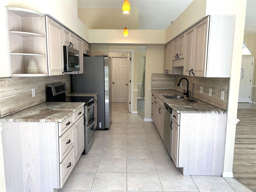 Photo of 9421 Fruitland Avenue, Englewood, FL 34224 (MLS # A4661976)