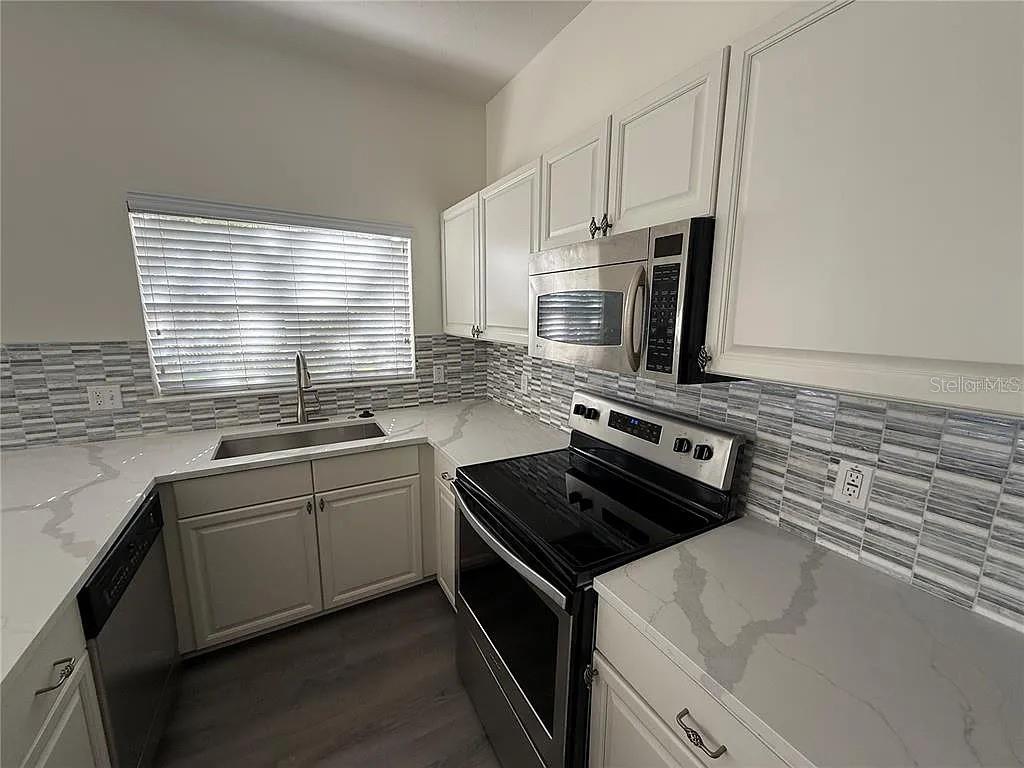 Photo of 3116 Toscana Circle, Tampa, FL 33611 (MLS # TB8543955)