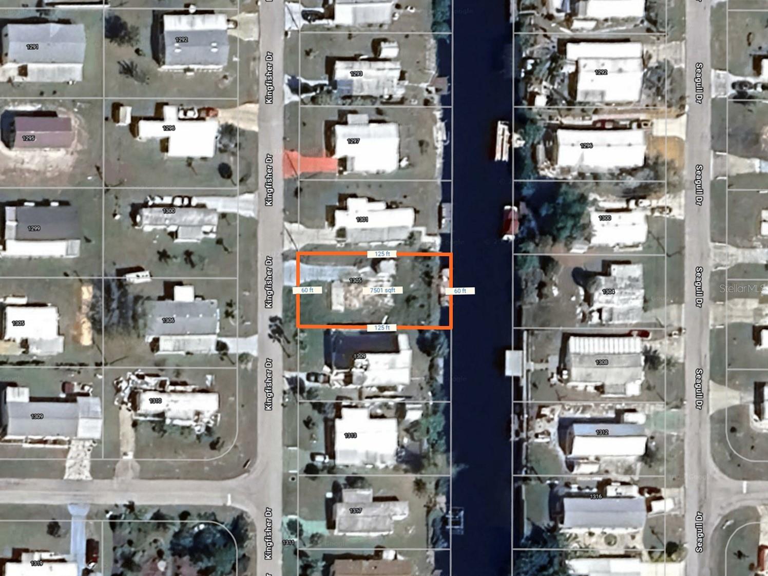 MANUFACTURED HOME COMMUNITY WITH SALT WATER ACCESS & YOU OWN YOUR LAND! No lot fees!!! This unique 55+ manufactured home community with large lots and CITY WATER and SEWER. This 60 x 125 cleared lot that previously had a manufactured home in place and the owner has maintained utility connections including water and sewer to save you on expensive impact fees. Water Front lot with driveway and utilities in place. Manatee Cove of Englewood (formally known as Holiday Mobile Estates 1) has a community boat ramp with access to the Gulf. Catfish Canal is a salt water canal that feeds into Rocky and Ainger Creeks and out into Lemon Bay and the Gulf of Mexico while Redfish Canal is a fresh water canal that flows behind Flamingo, offering fresh water fishing. Drive your golf cart or walk to one of the shared waterfront areas, the community center or drive your car to the beach. The closest beach is just 3.5 miles away! You will love all that this community offers! The low optional HOA fee is just $35 a year (required for use of the boat ramp and Community Center). The community center offers many community events including Pickleball, yoga, dances, bingo, crafts, dinners, shuffleboard and more! If you decide to venture out of this fabulous community you will enjoy being close to shopping, restaurants, a dozen golf courses, world class fishing, and so much more. There are several thousand acres of preserves and parks within a few minutes of this community. You do not want to miss out on all of this! Call TODAY!