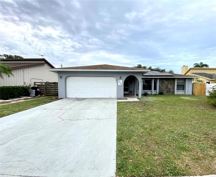 Opportunity knocks to own a three-bedroom, two-bath, two-car garage home on a fantastic street in the established and sought-after neighborhood of Glenbrooke! This home is located just moments away from The Mall at UTC, Whole Foods and a short drive to downtown Sarasota. Have peace of mind knowing your AC was just recently underwent a full servicing. The Home boasts new Solar panels which reduces monthly power costs to nothing! Only have to pay the FPL Membership fee! The newer roof, installed in 2015, will save you money on your insurance and make getting a new policy all that much easier. This home is move-in ready! An extra added bonus is the large screened-in lanai area that is sure to be used a ton all year round!. The fenced-in backyard adds extra privacy and security for Family Pets. With No CDDs and No HOA fees, this home is boasts a fantastic opportunity to live in a great community without the headache of having to receive any association approval for changes! Make this gem of a house your very own home today! Solar Panels have aloan that wll need to be assumed.