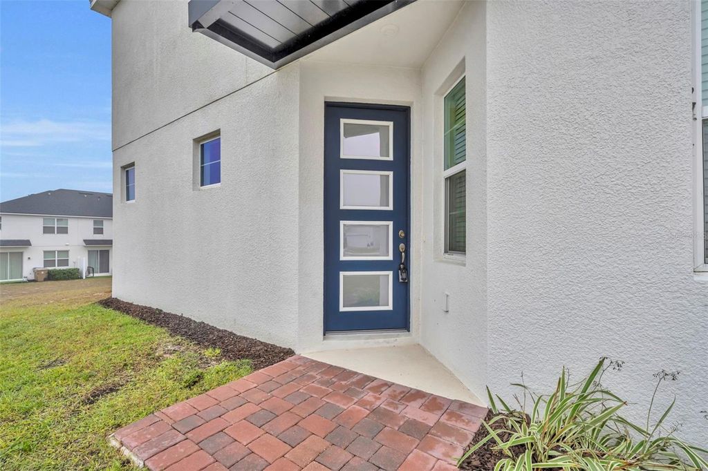 Photo of 1195 Boardwalk Place, Kissimmee, FL 34747 (MLS # O6371692)