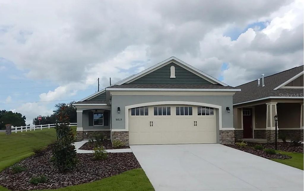Photo of 9819 SW 99th Loop, Ocala, FL 34481 (MLS # OM723422)
