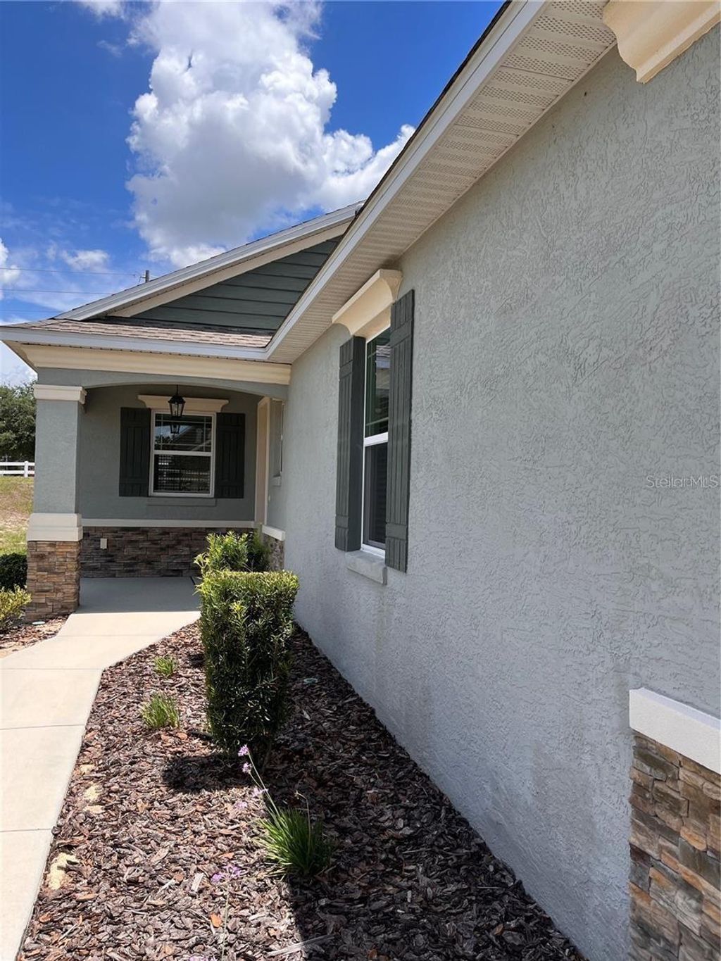 Photo of 9819 SW 99th Loop, Ocala, FL 34481 (MLS # OM723422)