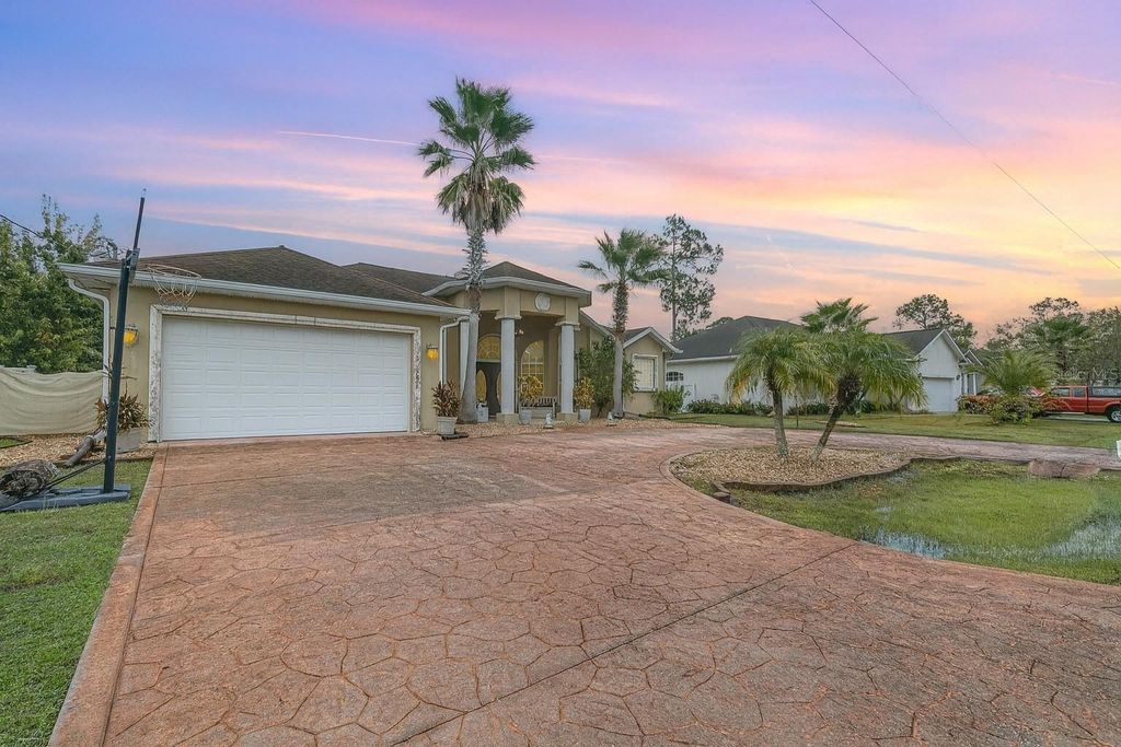 Photo of 30 E Diamond Drive, Palm Coast, FL 32164 (MLS # O6349473)