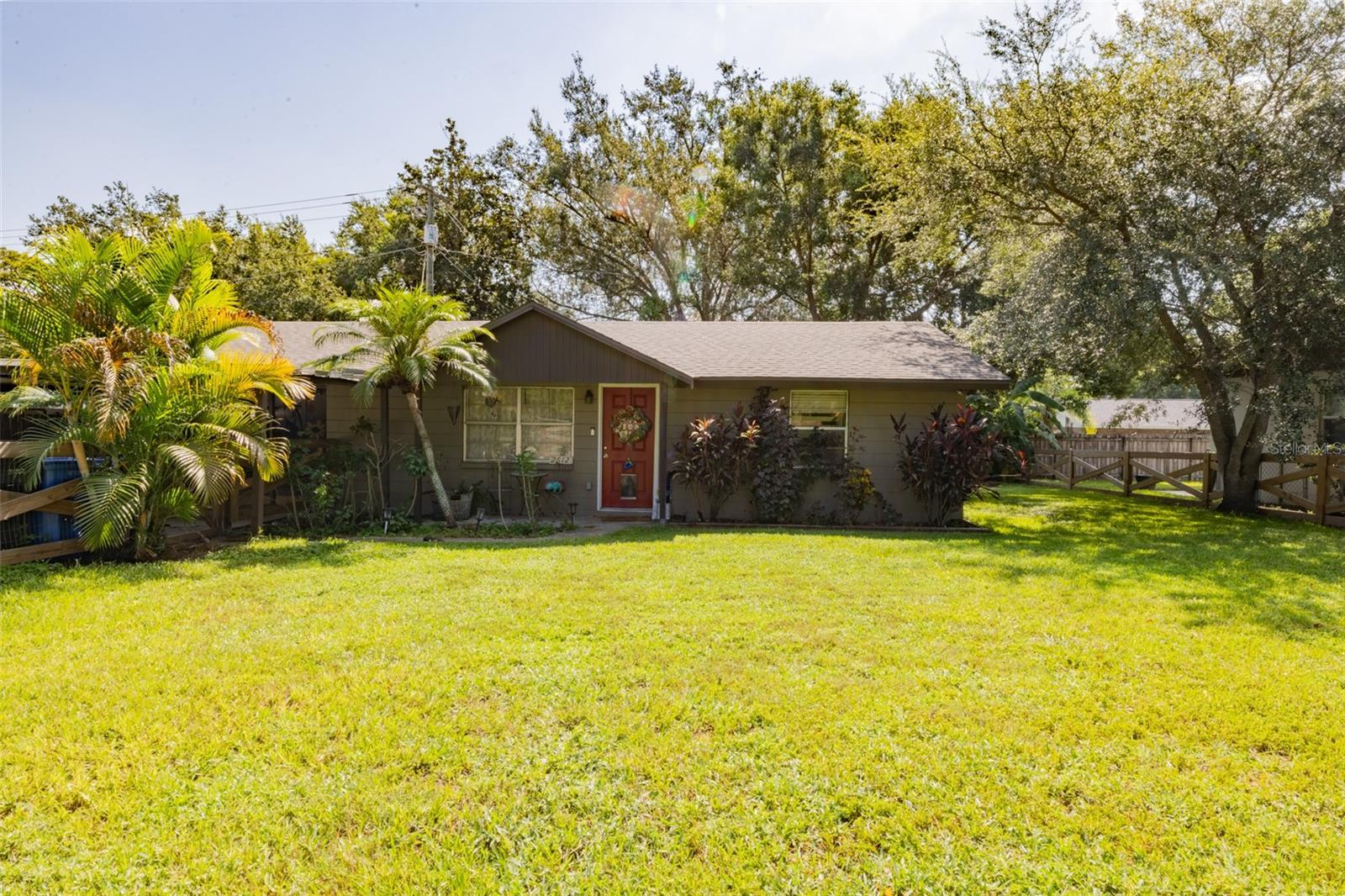 Fantastic opportunity to own this updated 2 bedroom/1 bathroom home in the Lynwood Park neighborhood in Seffner, Florida. New roof & AC. No HOA. Home features a double carport. Kitchen has been updated with stone countertops and upgraded appliances. Bathroom updates include gorgeous porcelain tile flooring, walk in shower with glass tile, & vanity with bowl sink. Living room features a wood accent wall and laminate flooring. Primary bedroom is spacious and has new tile that looks like wood. Laundry room is located off of the kitchen. Front and back yards are fenced with a double gate in the back to access the back carport that is 12X28 and 12 ft high. Back yard also features a fire pit and shed. Enjoy the Florida weather on your large patio that offers plenty of space for BBQ's and gatherings with family and friends. Location provides easy access to major highways and interstate systems.
