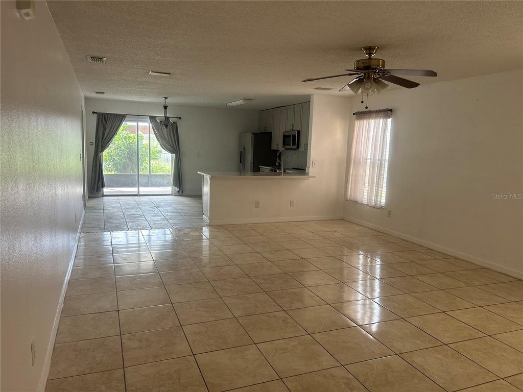 Photo of 1030 Crystal Bay Lane, Orlando, FL 32828 (MLS # O6453673)