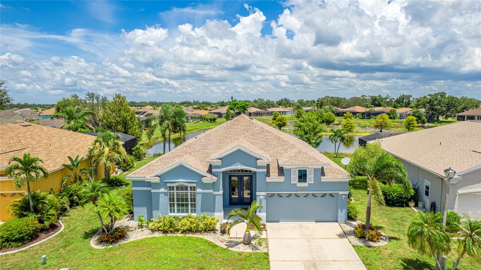 One or more photo(s) has been virtually staged. Welcome to this excellent home on a peaceful serene pond in Woodmere Lakes in Venice. Upon entering this home you will notice the 11 foot ceiling in the entryway and the 10 foot ceilings throughout the home. After a few more steps you will see through to the back of the home the sparkling clean pool and the very peaceful pond in the distance. You will especially favor the new panoramic pool cage that has the open view without the obstructive structural bars in the way. Daily you will see birds and ducks and other Florida wildlife in the pond. Inside please note the very open floor-plan, courtesy of the wall being removed in between the living room and dining room. This adds to the spacious feel of this home. The owners suite is separate from the other bedrooms. The home is in public records as a 4 bedroom yet bedroom 4 is a large office/den that is 14 feet deep so plenty of room for a closet to make it a true 4 bedroom. The large pool area has a 27 foot wide covered area and the 27-12 heated pool allows for plenty of room to cool off. Your maintenance items are all in great shape and the roof, AC system, hot water tank, water softener and water filtration system are all new in the last 2 years and the exterior was painted in 2024.
Location is key, and this home is ideally situated just minutes away from world-class golf courses, pristine beaches like Manasota Key, Venice Beach and Nokomis Beach. You also have easy access to downtown Venice with its many quaint and unique shops and restaurants . The Wellen Park District with more shops and restaurants is very convenient as well as the top rated Sarasota Memorial Hospital. you may also go to the Venice jetty and possibly see dolphins playing and a variety of boats cruising by. click on the link to view the 3D tour. This is set up for the full Florida lifestyle.