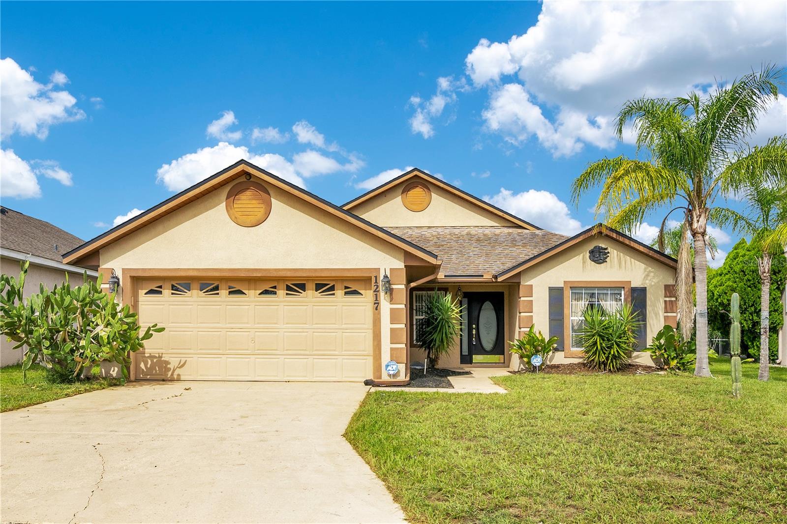 BEAUTIFUL FAIRWAYS LAKES!! Very Desirable POOL HOME! Possible Vacation Home or a *SHORT-TERM RENTAL ALLOWED this home has so many possibilities. UPDATED, FLOORING, PAINT Gorgeous! Home has a PRIVATE POOL with SCREEN ENCLOSURE with a view of the Golf course, 2 car garage, LANAI and central location to US - 27 and 192. Community amenities include a golf course, boat ramp, fishing dock, pool, tennis and basketball courts, barbecue area and playground. Also, you'll be about 15 MINUTES AWAY FROM DISNEY and within 2 miles of Publix, Aldi, Lowe's, Walmart, Orlando Health Hospital and many other businesses and restaurants. Schedule your private showing today.