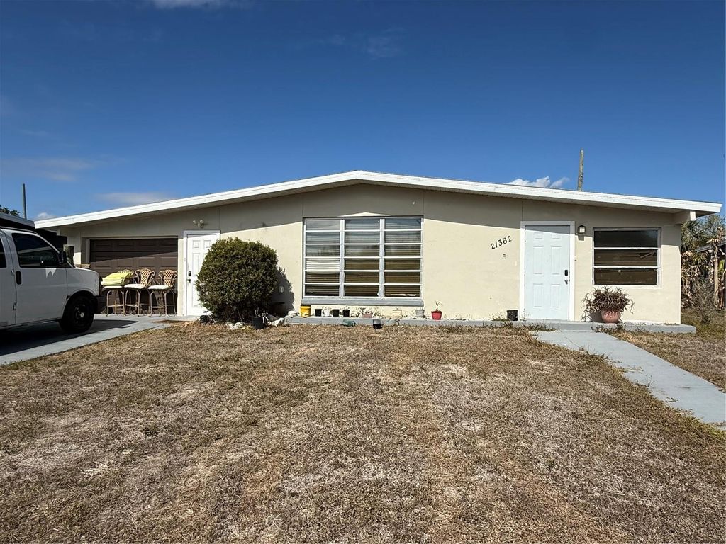 Photo of 21362 Meehan Avenue, Port Charlotte, FL 33952 (MLS # C7522154)