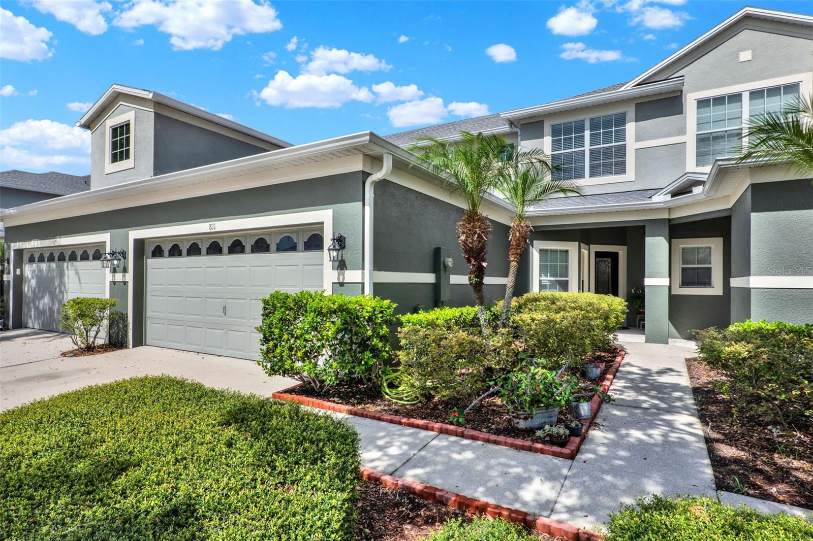 Discover the perfect blend of space, style, and convenience in this beautifully maintained townhome at Lake Mary Landings. Offering one of the community’s larger floor plans at over 1,900 sq. ft., this home is move-in ready and has meaningful updates, including a roof and AC that are both just 2 years old, providing peace of mind for years to come. Enjoy cooking and gathering in the well-equipped kitchen, featuring granite countertops, ample cabinet storage, and newer stainless steel appliances. The main living area features a bright, open layout with tile floors, while upstairs showcases rich real wood flooring with enhanced subflooring for added comfort and durability. The spacious primary suite is a true retreat, featuring a tray ceiling, generous walk-in closet, and a relaxing en-suite bath with dual sinks, soaking tub, and separate shower. Two generous sized additional bedrooms offer flexibility for family, guests, or a home office. Outside you find the screened lanai—perfect for morning coffee or evening relaxation. Just a short walk away, you'll find the community pool and playground, ideal for enjoying Florida’s outdoor lifestyle. Residents of Lake Mary Landings appreciate the convenience of included exterior maintenance, lawn care, gated security, and resort-style amenities, giving you more time to enjoy everything this vibrant area has to offer. Located near top-rated Seminole County schools, shopping, dining, and major roadways like I-4 and 417, this townhome puts you minutes from downtown Lake Mary, Winter Park, Sanford, and more.